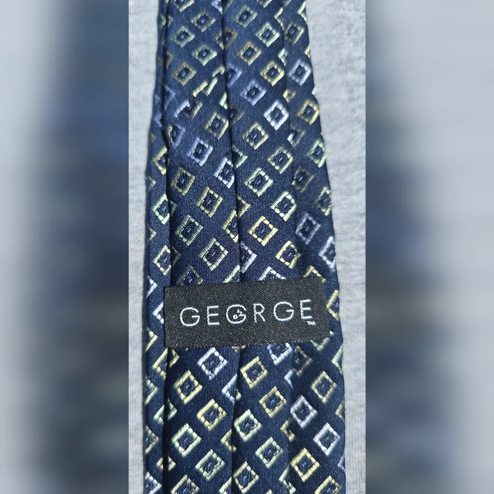 Boy's George Navy Clip On Tie w/ Yellow and Gold Diamond Pattern
